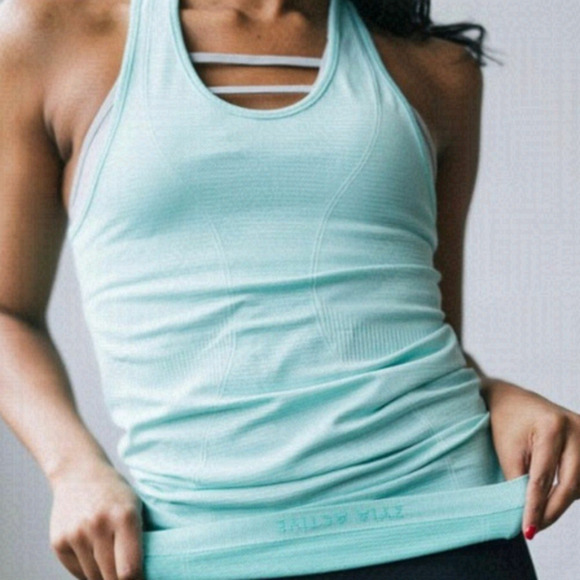 ZYIA Tops - NWOT Zyia Active, Turquoise Copper Charged Tank Top, Size L, Small pull in back